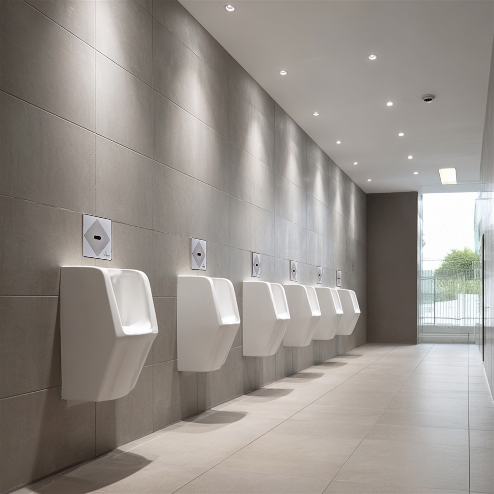 Light gold automatic flush fixture for commercial restroom water management and programmed flushing