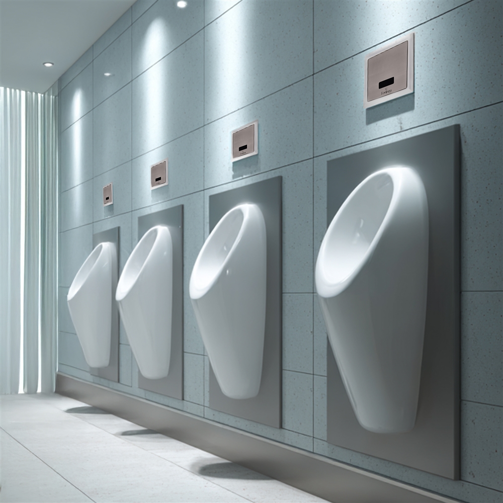 Automatic touchless faucet with infrared sensor in a public restroom lavatory